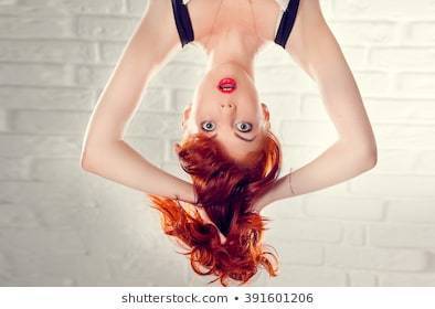 surprised-greeneyed-girl-upside-down-260nw-391601206.jpg